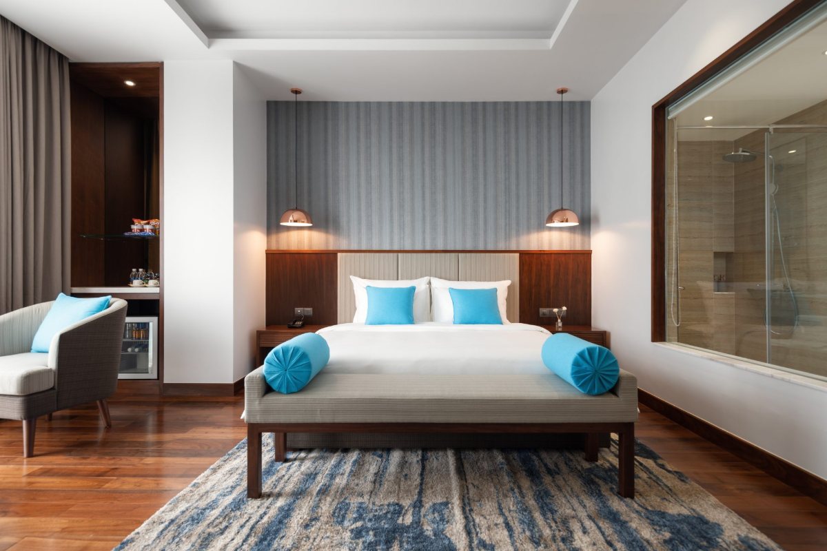 King bed in the Superior King room at D'Lecia Ha Long