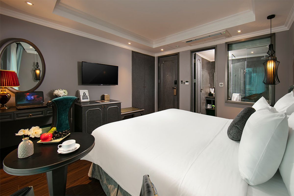 King bed in the Deluxe Room at Hanoi L'Heritage Hotel