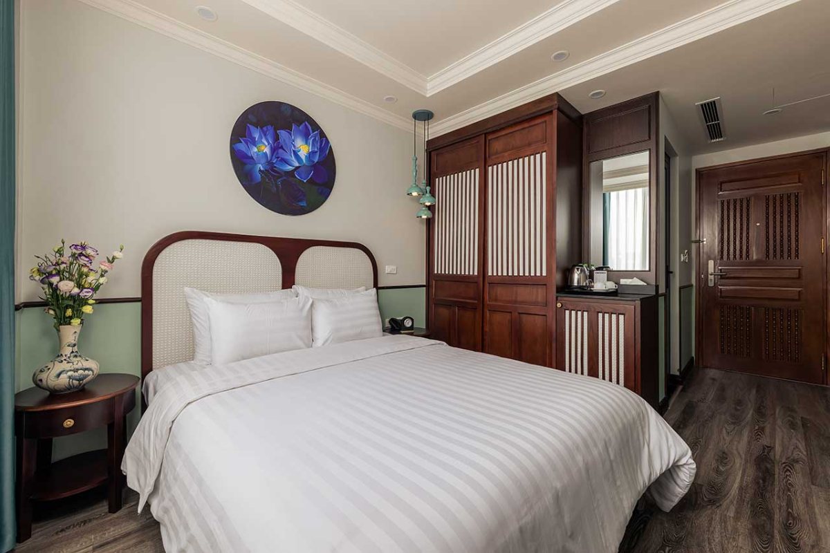 King bed in the Executive City View room at Lotusama Hanoi Hotel