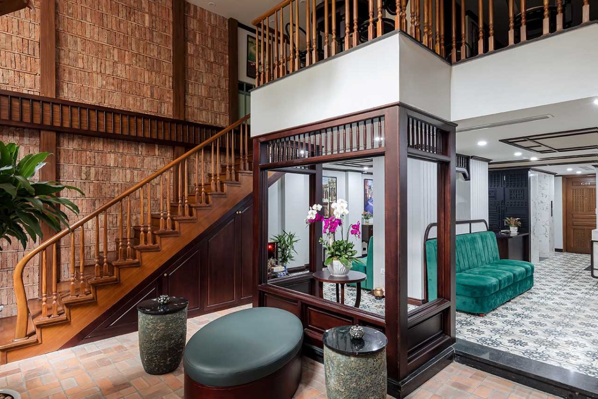 Wooden staircase and lounge at Lotusama Hanoi Hotel