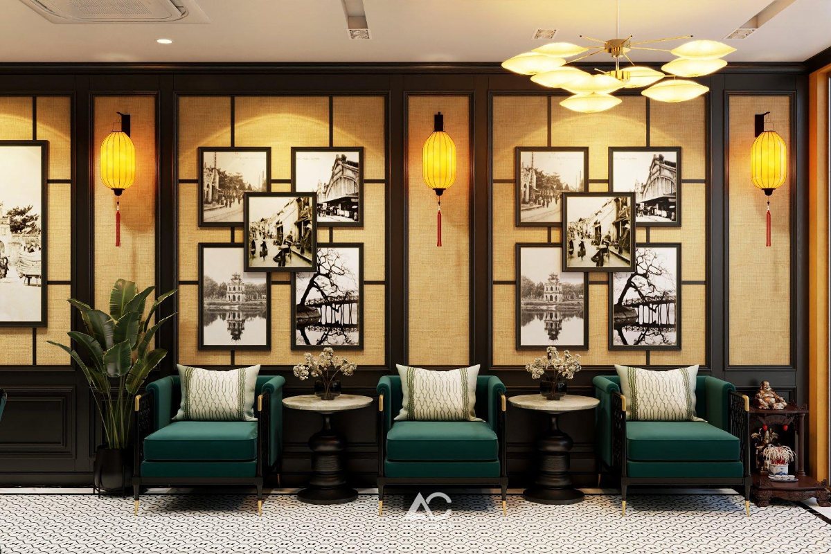 Lounge with green sofas at Omina Hanoi Hotel