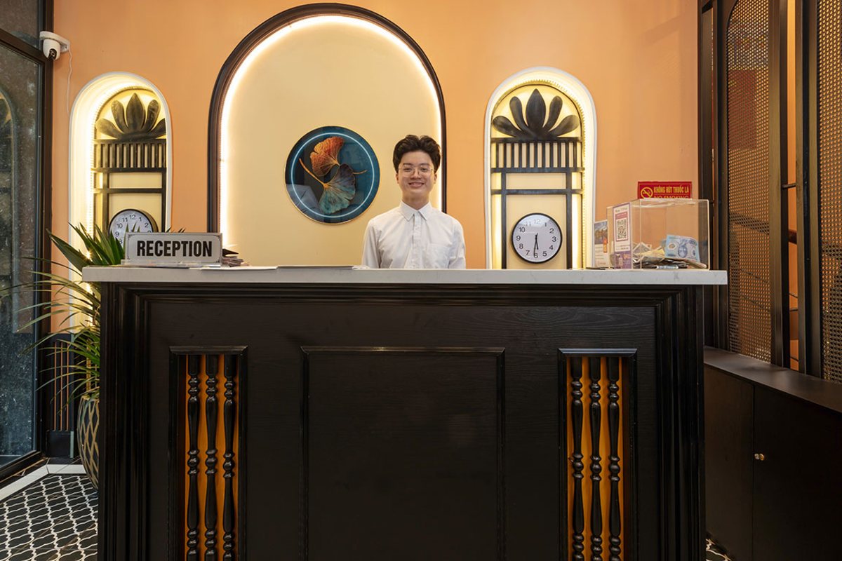 Reception desk at Omina Hanoi Hotel