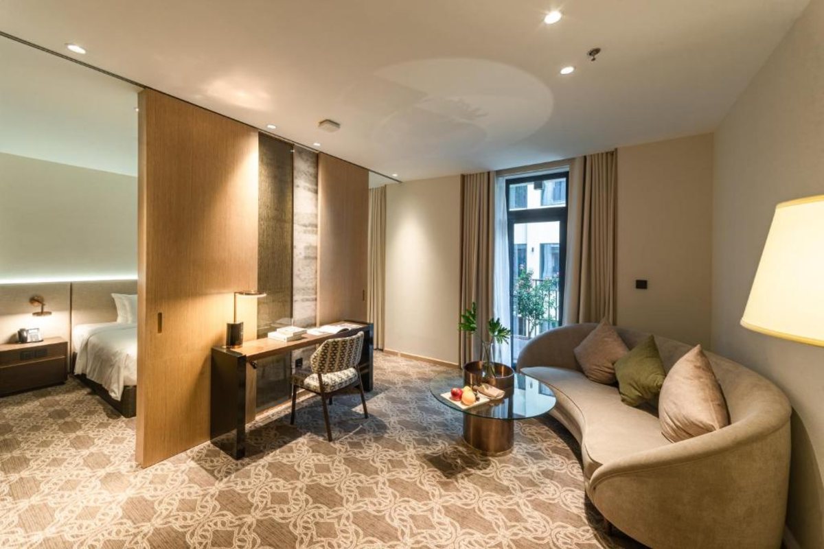 Suite with Balcony interior at REY Hotel Hanoi