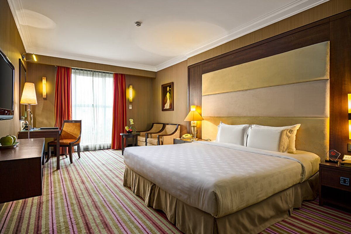 Seating area in the Premium Executive room at Silk Path Hotel Hanoi