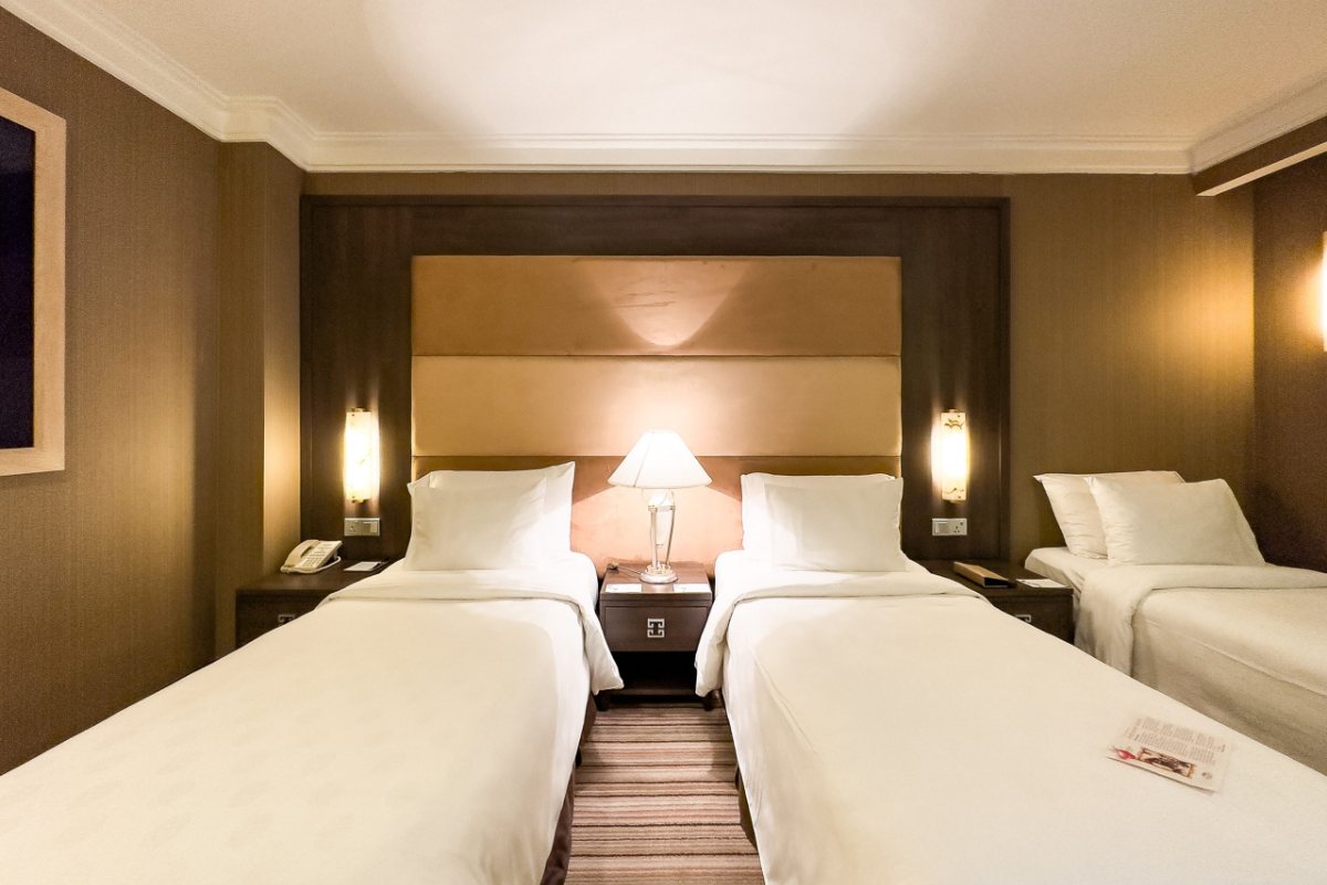 Beds in the Triple room at Silk Path Hotel Hanoi