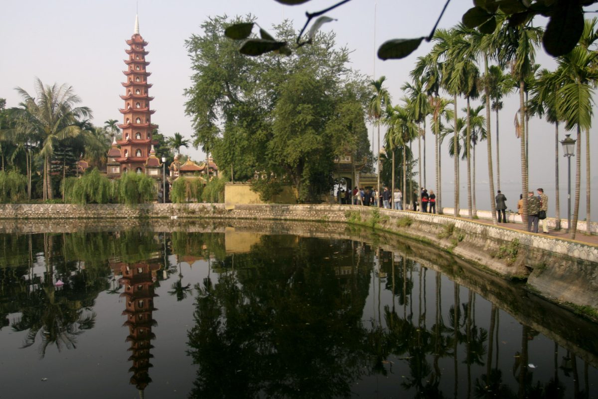 Tran Quoc Pagoda tower reflected in West Lake, Tay Ho, Hanoi