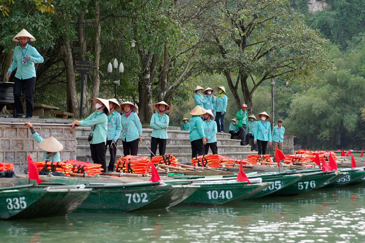 Rowing boats waiting for visitors at the Trang An Landscape Complex, Ninh Binh