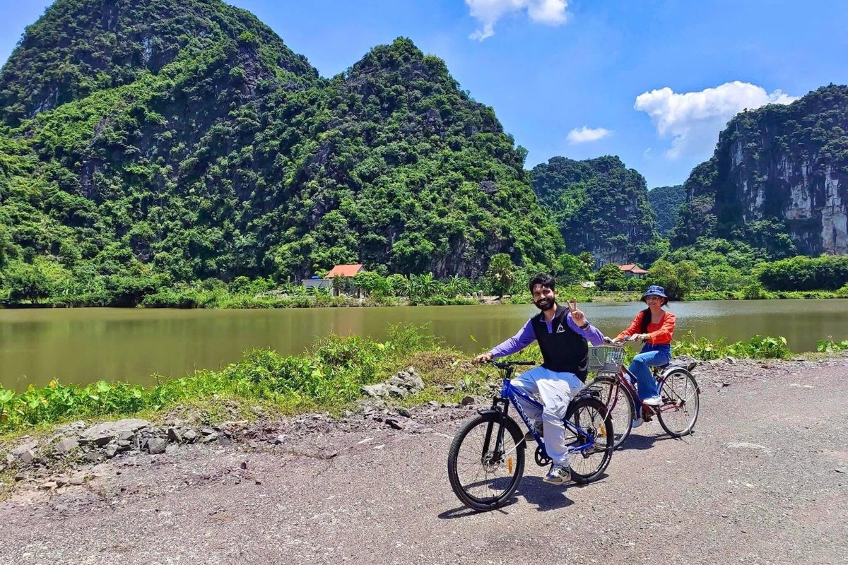 Cycling through the countryside near Trang An Heritage Garden