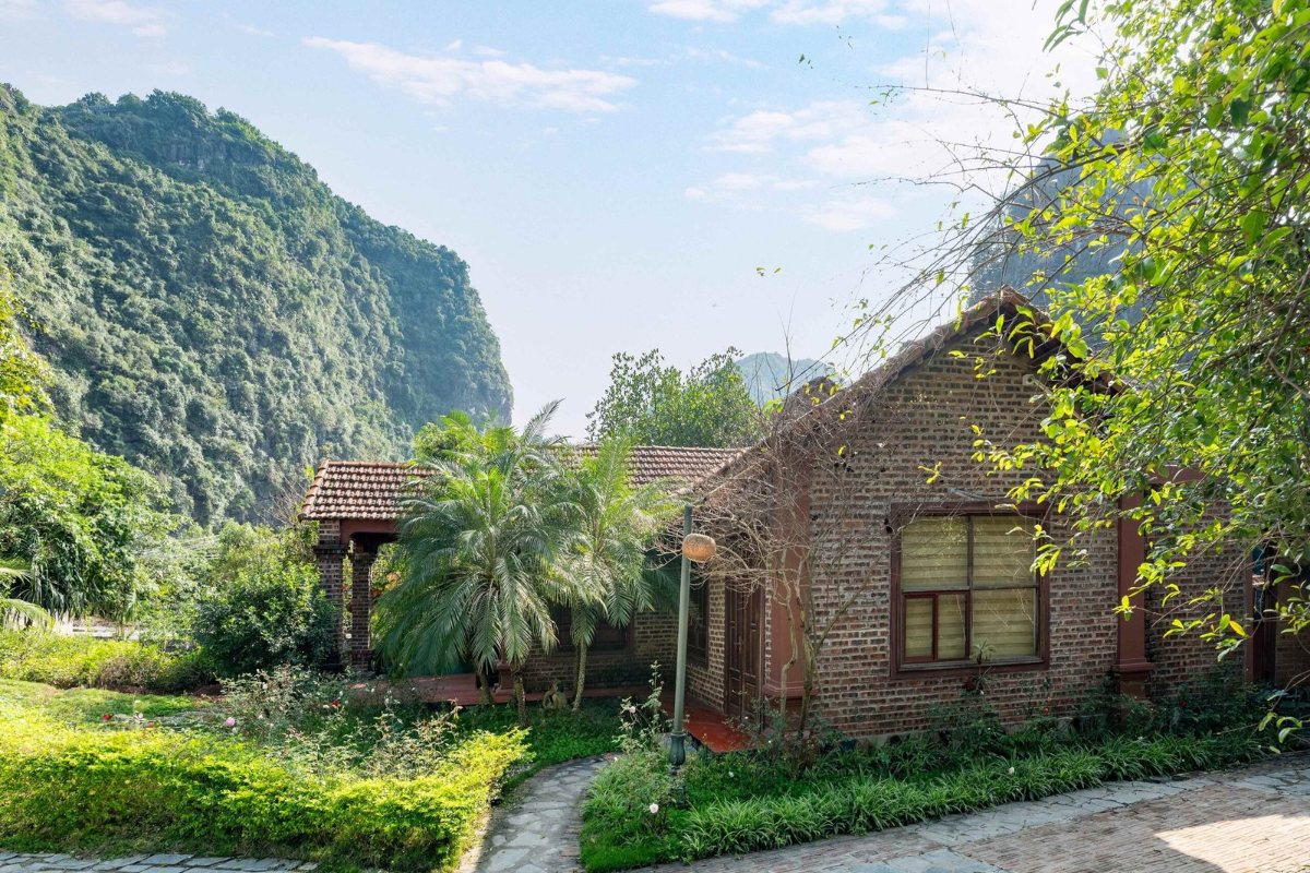 Garden and limestone mountains at Trang An Heritage Garden